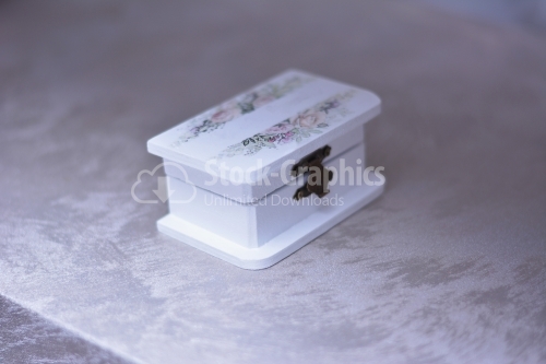 White box with floral motifs for accessories.