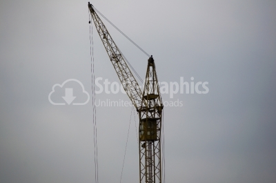 Abstract Industrial background with construction cranes silhouet