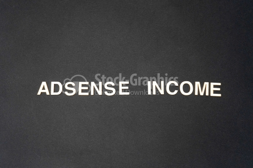 ADSENSE INCOME word written on dark paper background. ADSENSE INCOME text for your concepts
