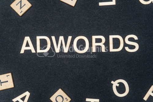 ADWORDS word written on dark paper background. ADWORDS text for your concepts