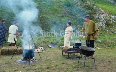 Ancient people preparing meals