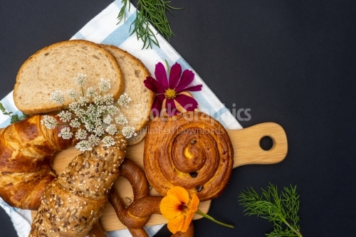 Arrangement with bread on cutting board