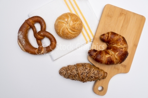 Assorted croisants on white towel