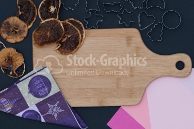 Baking background with dried fruits and christmas decoration