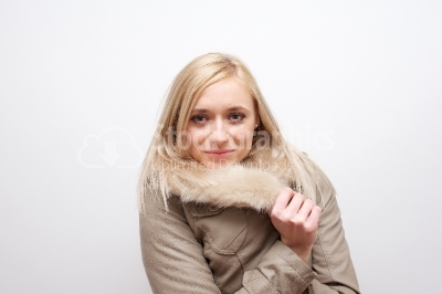 Beautiful blonde woman in winter time