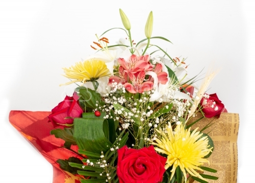 Beautiful bouquet of gerbera, carnations and other flowers in re
