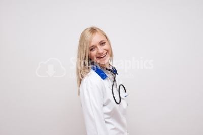 Beautiful smiling female doctor - Stock Image