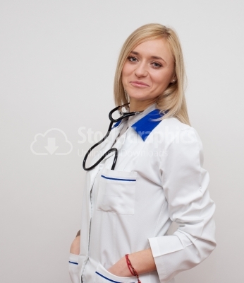 Beautiful smiling female doctor - Stock Image