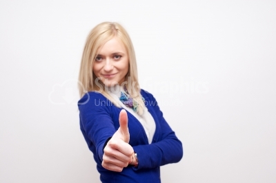 Beautiful young woman making thumbs up sign