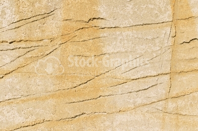 Beige wall with dirty yellow scratched