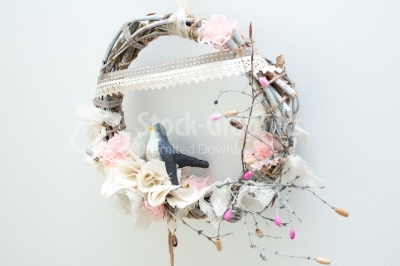 Bird on a wreath fashioned