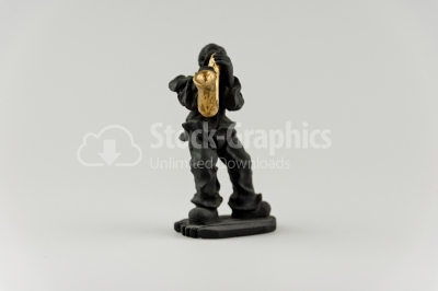 Black ceramic ornament photo- man playing the saxophone