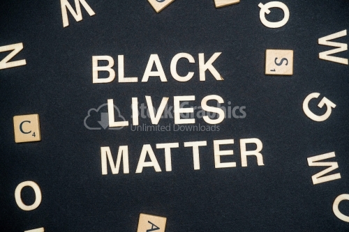 BLACK LIVES MATTER word written on dark paper background. BLACK LIVES MATTER text for your concepts