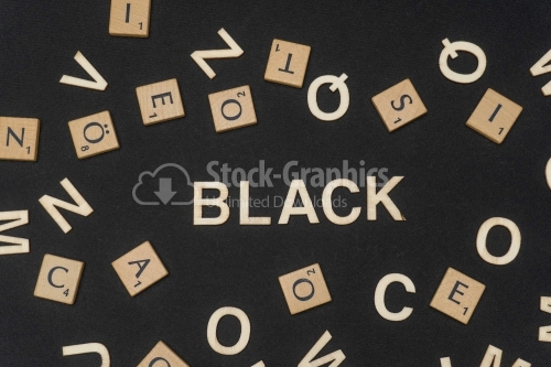 BLACK word written on dark paper background. BLACK text for your concepts