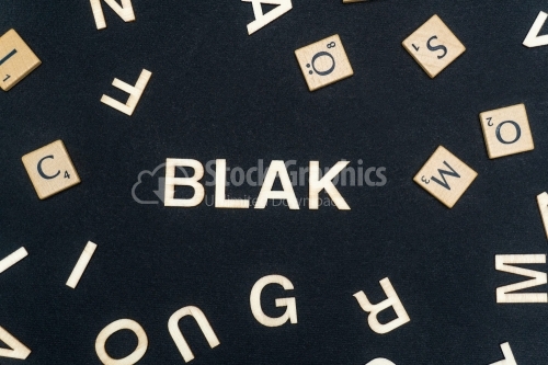 BLAK word written on dark paper background. BLAK text for your concepts
