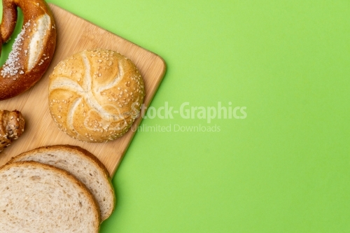 Bread arrangement on a green background