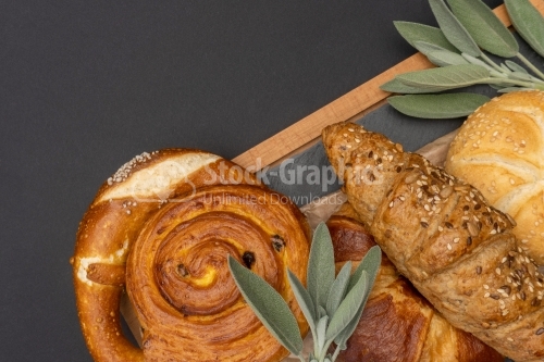 brekfast breads on dark cooking board