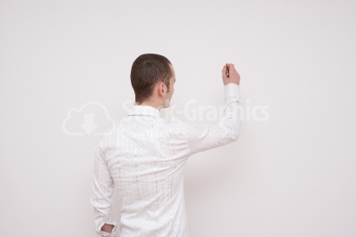 Businessman With Pen looking at the wall