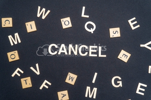 CANCEL word written on dark paper background. CANCEL text for your concepts