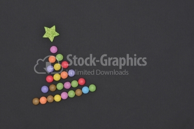 Candies Christmas tree with green star, top view