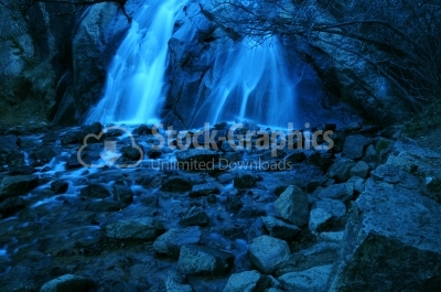 Cascade in the forest in the night