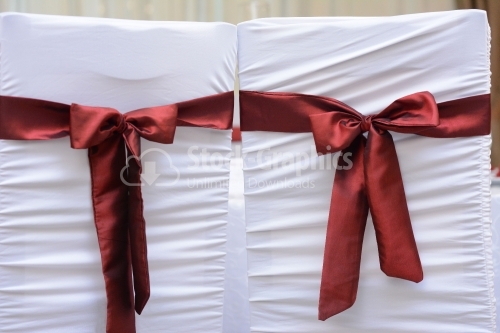 Chair for groom and bride with red accents