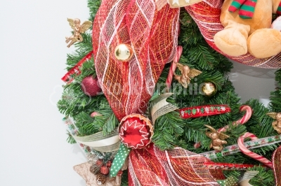 Christmas bauble on artificial christmas wreath