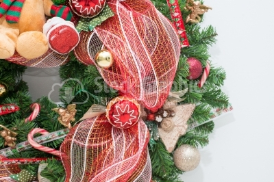 Christmas baubles on garland and candy accent