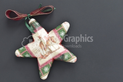 Christmas star on dark wooden background