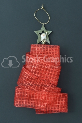 Christmas tree made of a red ribbon