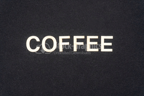 COFFEE word written on dark paper background. COFFEE text for your concepts