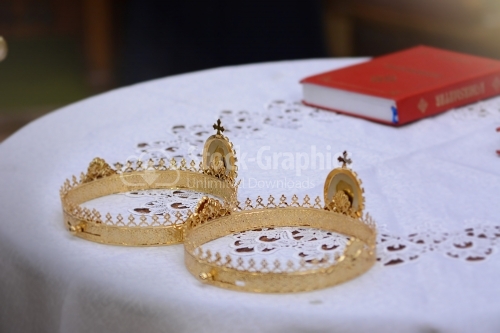 Crown for a orthodox wedding ceremony and religious book.