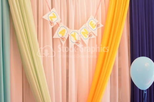 Decorative drapery tulle with a baby name on it