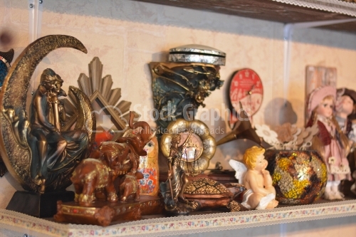 Decorative objects on a store shelf.