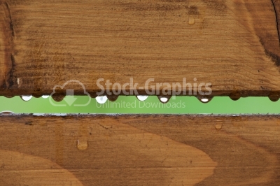 Drops of dew on the plank of wood
