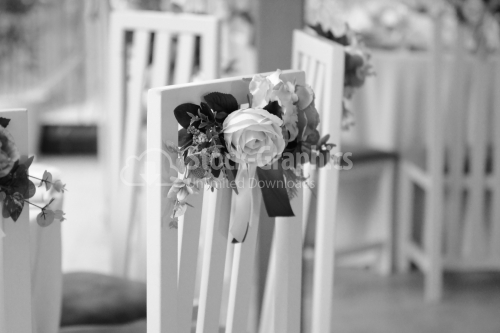 Elegant bouquet of flowers on a wedding chair