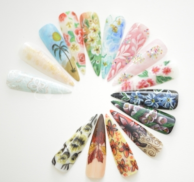 Fake nails painted with floral motifs