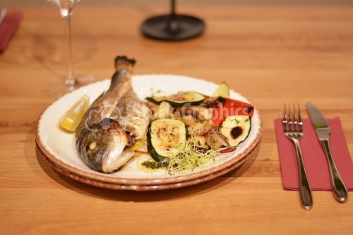 Fried trout with sauteed mushrooms and grilled peppers and zucchini.