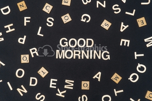 GOOD MORNING word written on dark paper background. GOOD MORNING text for your concepts