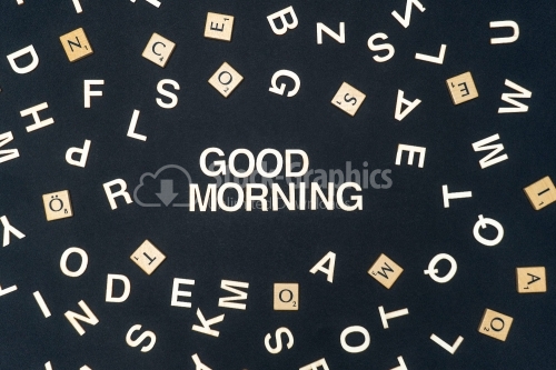 GOOD MORNING word written on dark paper background. GOOD MORNING text for your concepts