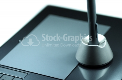 Graphic tablet with pen close-up