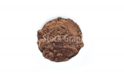 Ground coffee in whte bowl top view