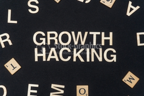 GROWTH HACKING word written on dark paper background. GROWTH HACKING text for your concepts