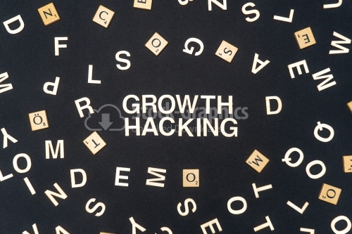 GROWTH HACKING word written on dark paper background. GROWTH HACKING text for your concepts