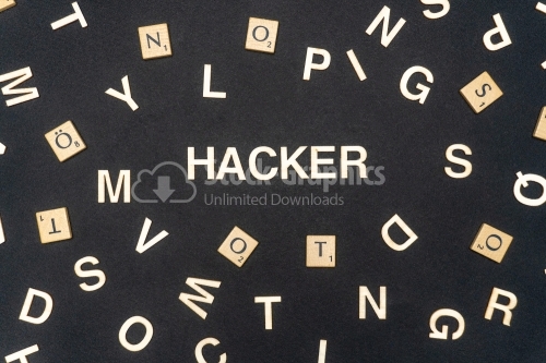 HACKER word written on dark paper background. HACKER text for your concepts