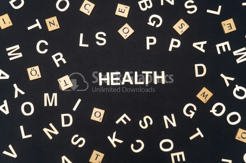 HEALTH word written on dark paper background. HEALTH text for your concepts