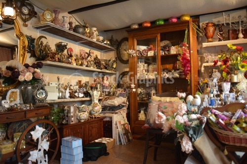 Inside a shop with trinkets and more.