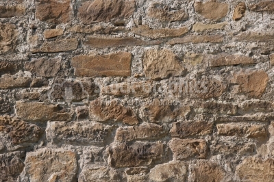 Irregular natural old stone wall texture