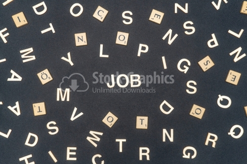 JOB word written on dark paper background. JOB text for your concepts