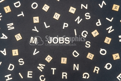 JOBS word written on dark paper background. JOBS text for your concepts